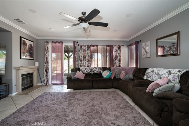 39269 Clear View Ct, Palmdale, CA 93551 - living area featuring tile patterned floors, crown molding, a ceiling fan, and a glass covered fireplace