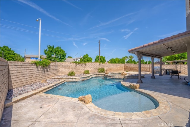 39269 Clear View Ct, Palmdale, CA 93551 - view of swimming pool with a fenced backyard, a patio area, and a pool with connected hot tub