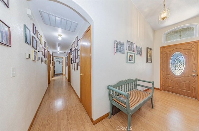 35095 Rough Rider Way, Raymond, CA 93653 - foyer featuring light wood-style flooring and arched walkways
