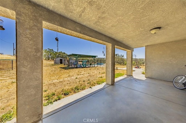35095 Rough Rider Way, Raymond, CA 93653 - fenced backyard featuring a patio and a shed