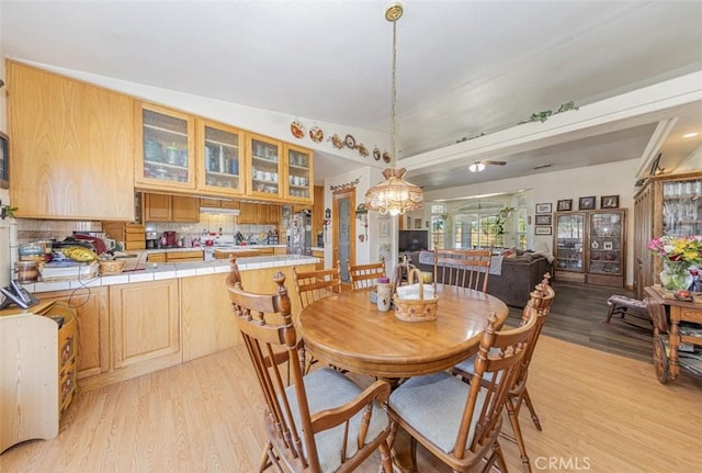 35095 Rough Rider Way, Raymond, CA 93653 - dining area featuring light wood-style floors and a chandelier