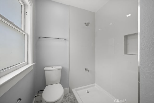 12950 7th St, Chino, CA 91710 - full bathroom featuring toilet and tiled shower