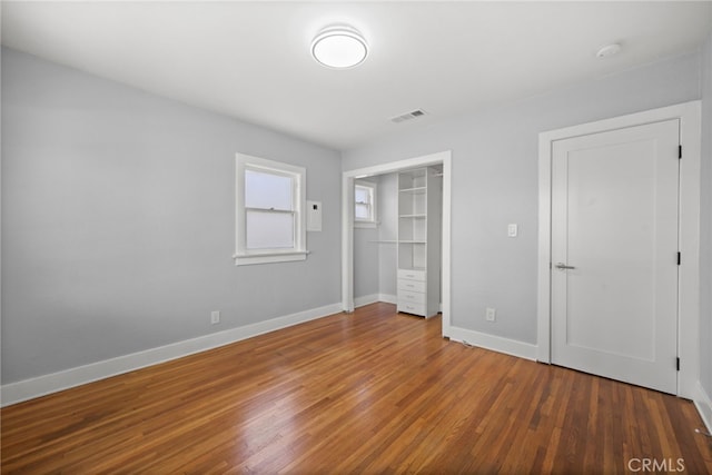 12950 7th St, Chino, CA 91710 - unfurnished bedroom featuring wood finished floors and a closet