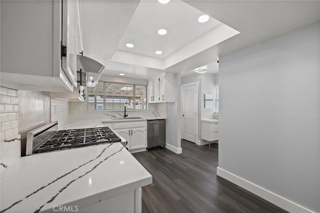 12950 7th St, Chino, CA 91710 - kitchen with stainless steel appliances, backsplash, recessed lighting, white cabinetry, and dark wood-style floors