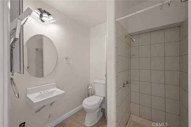 12950 7th St, Chino, CA 91710 - full bathroom featuring a tile shower and tile patterned floors