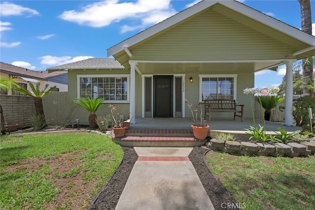 12950 7th St, Chino, CA 91710 - bungalow-style home with a porch and a shingled roof