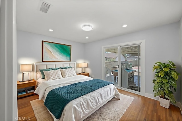 12950 7th St, Chino, CA 91710 - bedroom featuring access to outside, wood finished floors, and recessed lighting