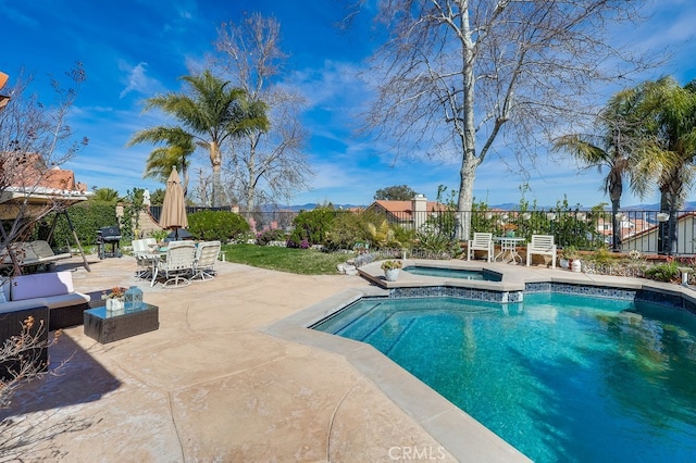 24813 Sagecrest Cir, Stevenson Ranch, CA 91381 - view of swimming pool featuring a patio area, an outdoor hangout area, outdoor dining area, and a pool with connected hot tub