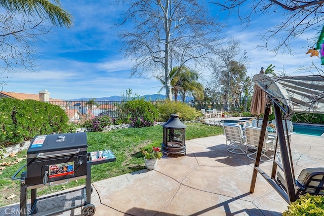 24813 Sagecrest Cir, Stevenson Ranch, CA 91381 - view of patio / terrace featuring grilling area, a mountain view, and an outdoor pool