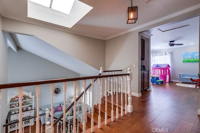 24813 Sagecrest Cir, Stevenson Ranch, CA 91381 - corridor featuring dark wood-type flooring, an upstairs landing, a skylight, and ornamental molding