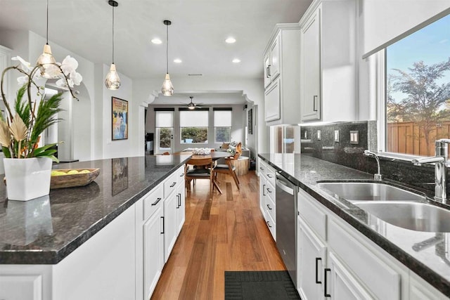 2830 Paradise Ridge Ct, Chula Vista, CA 91915 - kitchen featuring recessed lighting, a ceiling fan, wood finished floors, tasteful backsplash, and white cabinets