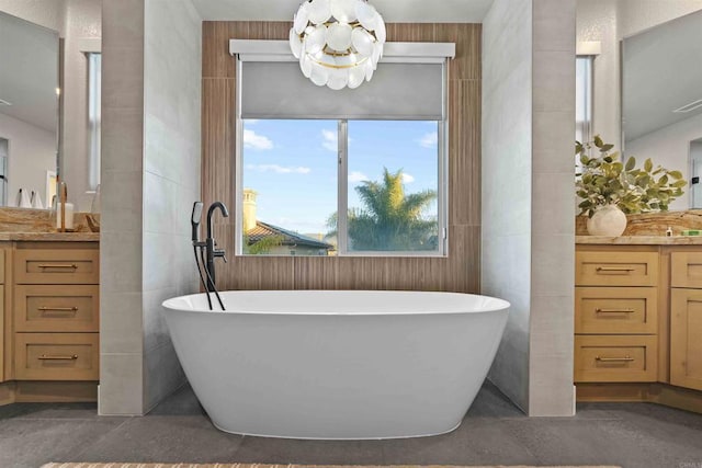 2830 Paradise Ridge Ct, Chula Vista, CA 91915 - bathroom with vanity, a chandelier, a soaking tub, and tile walls
