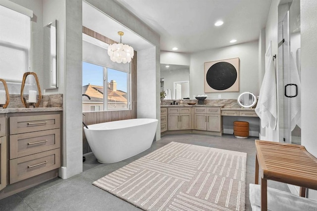 2830 Paradise Ridge Ct, Chula Vista, CA 91915 - full bathroom with vanity, a freestanding bath, recessed lighting, a chandelier, and finished concrete flooring