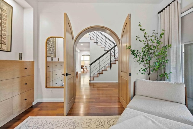 2830 Paradise Ridge Ct, Chula Vista, CA 91915 - foyer with dark wood finished floors, arched walkways, and stairway