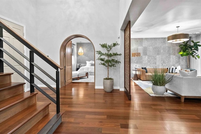 2830 Paradise Ridge Ct, Chula Vista, CA 91915 - entrance foyer featuring stairway, wood finished floors, and arched walkways