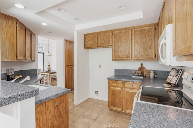 407 Mountain Laurel Ct, Mountain View, CA 94043 - kitchen with white microwave, electric range oven, recessed lighting, light tile patterned flooring, and dark countertops