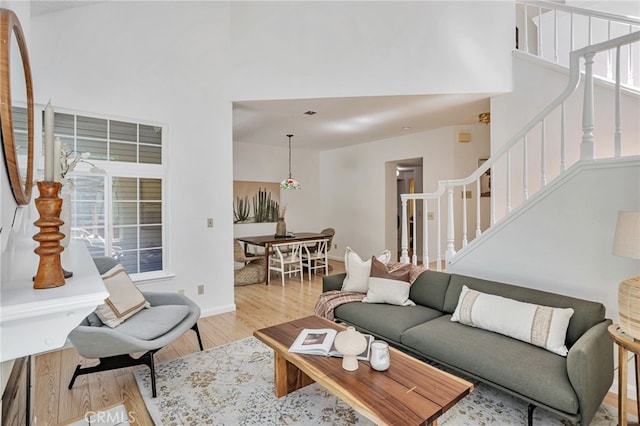 407 Mountain Laurel Ct, Mountain View, CA 94043 - living room featuring stairway and light wood finished floors