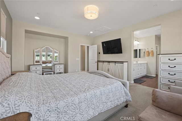 531 Owens River Dr, Oxnard, CA 93036 - bedroom featuring wood finished floors, recessed lighting, and ensuite bath
