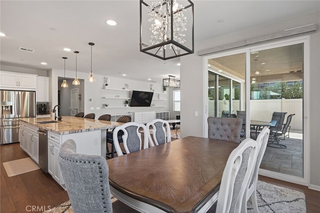 531 Owens River Dr, Oxnard, CA 93036 - dining area featuring dark wood-type flooring, recessed lighting, and a chandelier