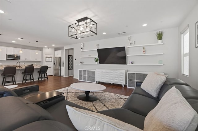 531 Owens River Dr, Oxnard, CA 93036 - living area with recessed lighting and dark wood finished floors