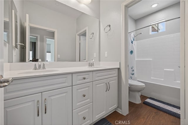 531 Owens River Dr, Oxnard, CA 93036 - full bath with double vanity, wood finished floors, and shower / bath combo with shower curtain