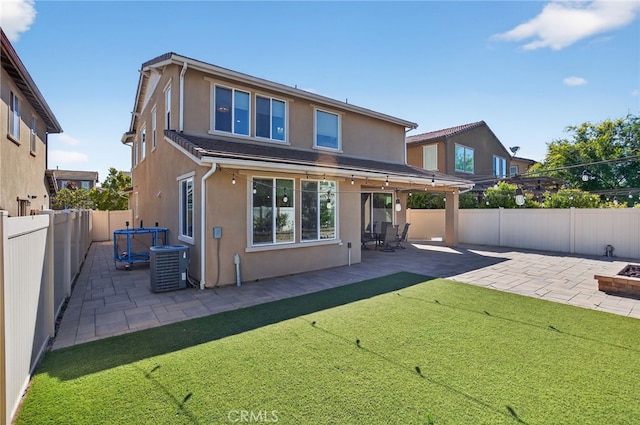 531 Owens River Dr, Oxnard, CA 93036 - rear view of property featuring stucco siding, a fenced backyard, and a patio area