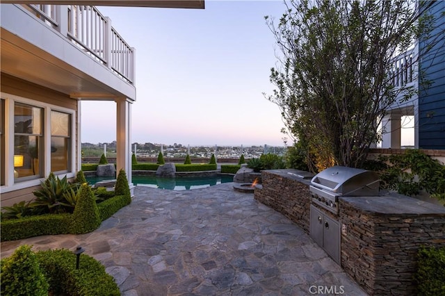 57 Cape Andover, Newport Beach, CA 92660 - patio / terrace featuring exterior kitchen, a patio area, and an outdoor pool