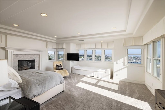 57 Cape Andover, Newport Beach, CA 92660 - bedroom with carpet flooring, a raised ceiling, recessed lighting, and a brick fireplace