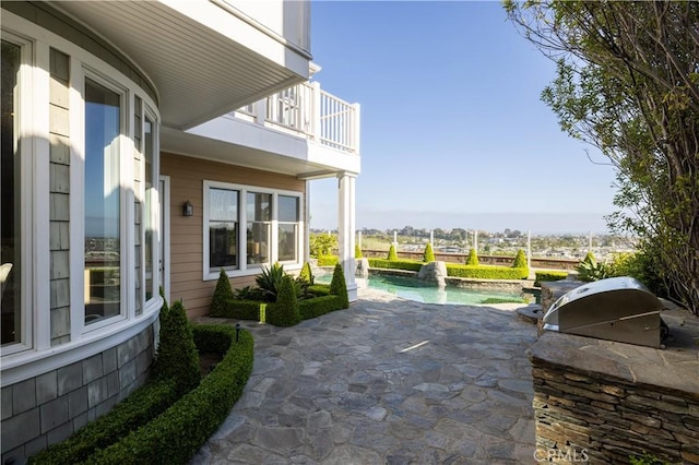 57 Cape Andover, Newport Beach, CA 92660 - patio / terrace with an outdoor pool, an outdoor kitchen, and a patio area