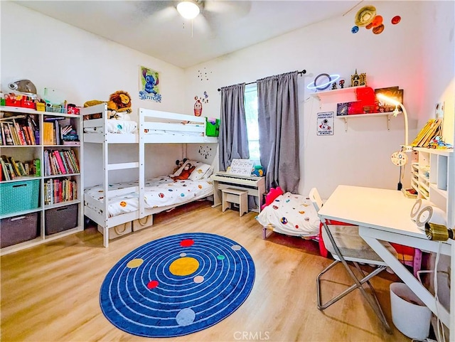 4216 Dalton Ave, Los Angeles, CA 90062 - bedroom featuring wood finished floors and a ceiling fan