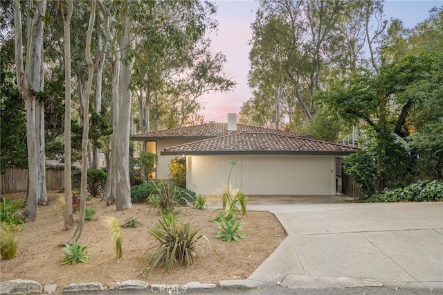 105 Via Capay, Palos Verdes Estates, CA 90274 - mediterranean / spanish home with a tile roof, driveway, a chimney, and a garage