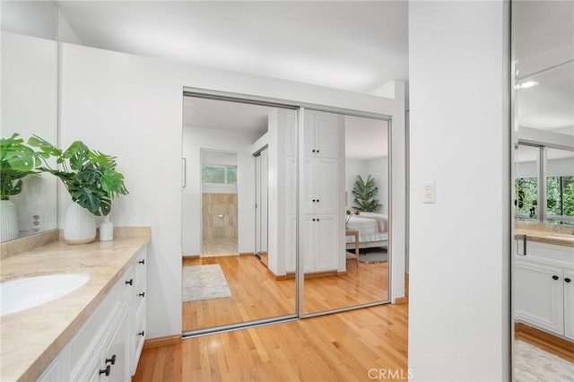 105 Via Capay, Palos Verdes Estates, CA 90274 - bathroom featuring vanity, wood finished floors, and connected bathroom