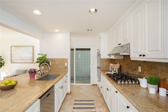 105 Via Capay, Palos Verdes Estates, CA 90274 - kitchen featuring under cabinet range hood, stainless steel appliances, light tile patterned floors, white cabinets, and light stone countertops