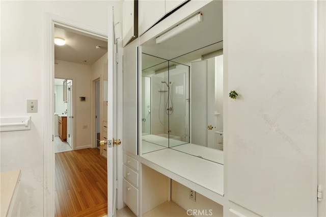 4041 57th St, Sacramento, CA 95820 - bathroom with a shower stall and wood finished floors