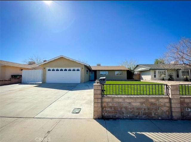 429 N Peg St, Ridgecrest, CA 93555 - ranch-style home featuring a fenced front yard, a garage, concrete driveway, and stucco siding
