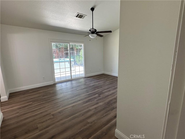 899 La Jolla Way, Merced, CA 95348 - empty room featuring ceiling fan, dark wood-style flooring, and a textured ceiling