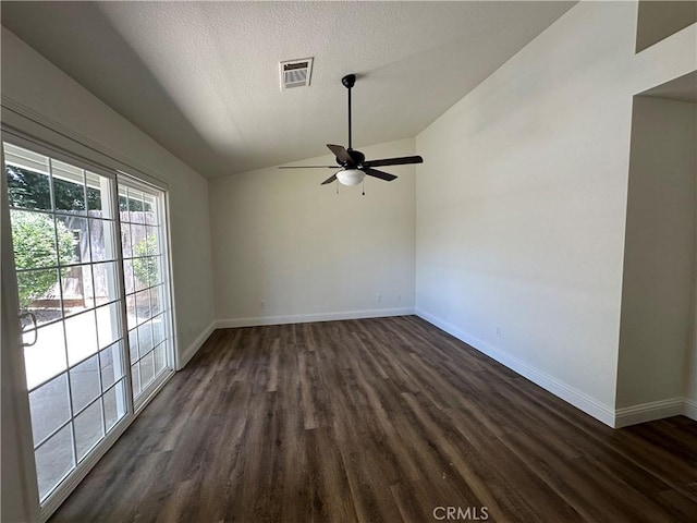 899 La Jolla Way, Merced, CA 95348 - spare room featuring lofted ceiling, a ceiling fan, dark wood-style flooring, and a textured ceiling