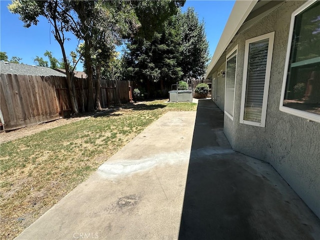 899 La Jolla Way, Merced, CA 95348 - fenced backyard featuring a patio area