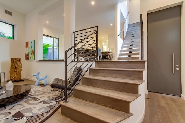 940 Burleigh Dr, Pasadena, CA 91105 - stairway featuring wood finished floors, healthy amount of natural light, and recessed lighting