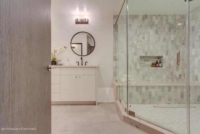 940 Burleigh Dr, Pasadena, CA 91105 - bathroom featuring vanity, tile patterned flooring, and a stall shower