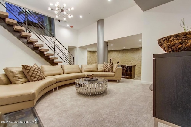 940 Burleigh Dr, Pasadena, CA 91105 - carpeted living room featuring stairs, a chandelier, a towering ceiling, and recessed lighting