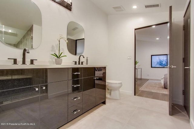 940 Burleigh Dr, Pasadena, CA 91105 - full bathroom featuring double vanity, tile patterned flooring, and recessed lighting