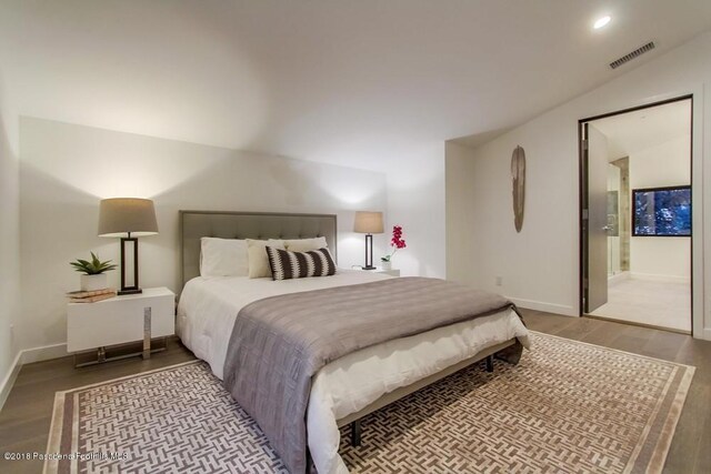 940 Burleigh Dr, Pasadena, CA 91105 - bedroom with wood finished floors and connected bathroom