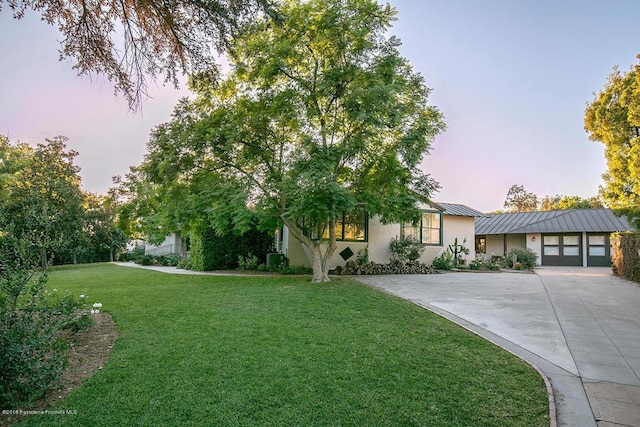 1425 Wentworth Ave, Pasadena, CA 91106 - view of front of home featuring a yard, a standing seam roof, and a metal roof