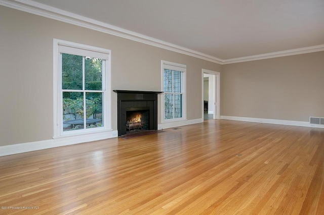 1425 Wentworth Ave, Pasadena, CA 91106 - unfurnished living room with crown molding, light wood finished floors, plenty of natural light, and a brick fireplace
