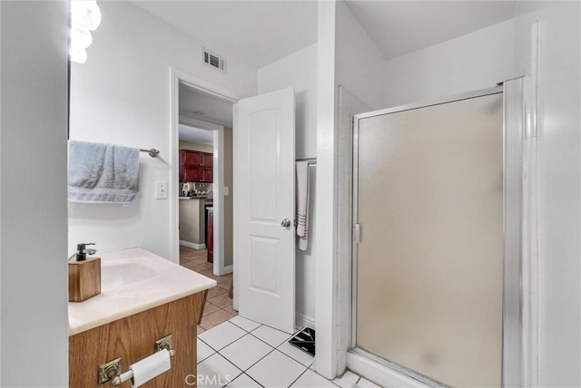 195 Morristown Ln, Costa Mesa, CA 92626 - bathroom featuring tile patterned floors, a stall shower, and vanity