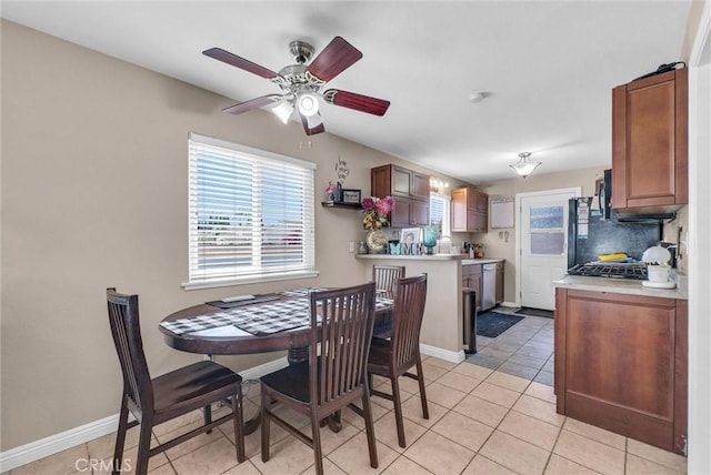 195 Morristown Ln, Costa Mesa, CA 92626 - dining space featuring a ceiling fan and light tile patterned flooring