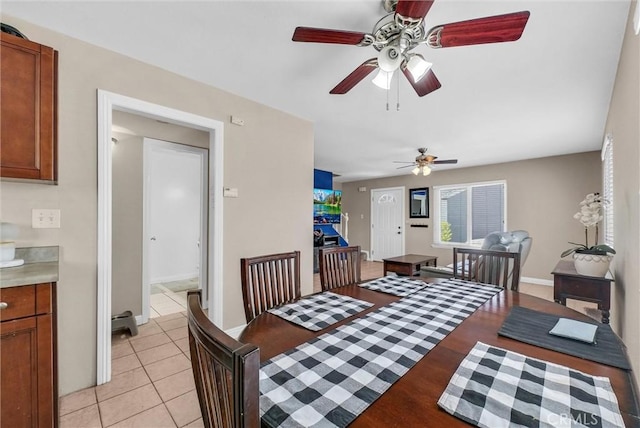 195 Morristown Ln, Costa Mesa, CA 92626 - dining area with a ceiling fan and light tile patterned floors