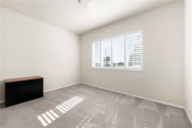 1706 Brittney Rd, Beaumont, CA 92223 - spare room with carpet floors and baseboards