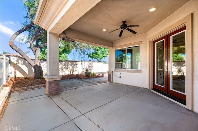 1706 Brittney Rd, Beaumont, CA 92223 - fenced backyard featuring french doors, a patio area, and ceiling fan